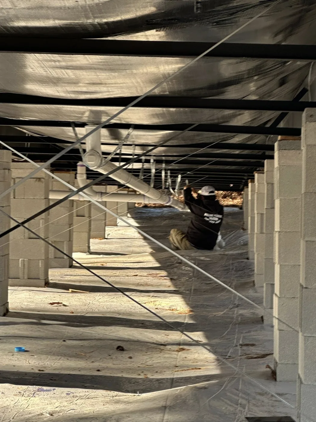 New plumbing lines installed under a home by Williams Plumbing & Repair LLC