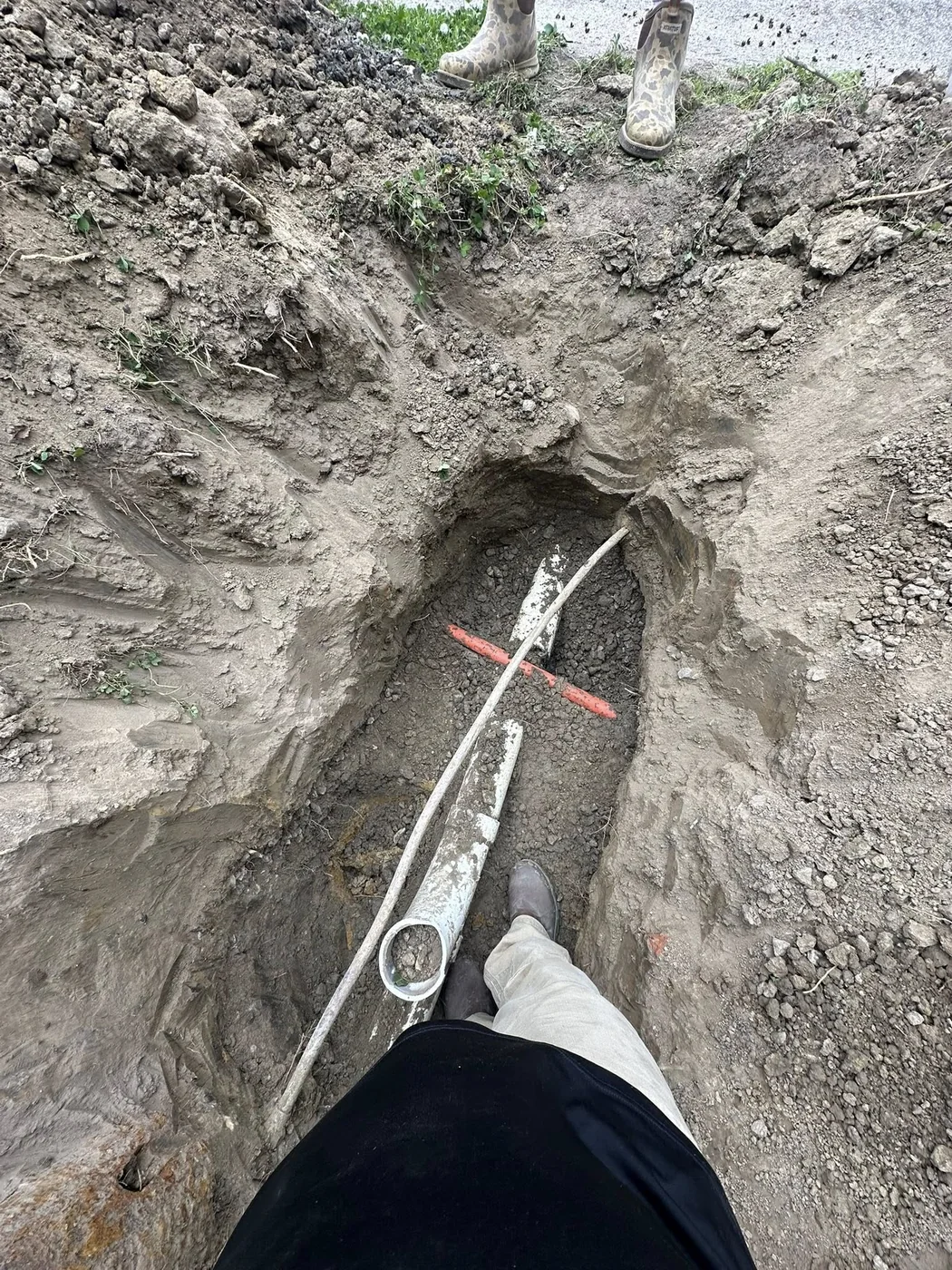 Excavated pipe repair work by Williams Plumbing & Repair LLC