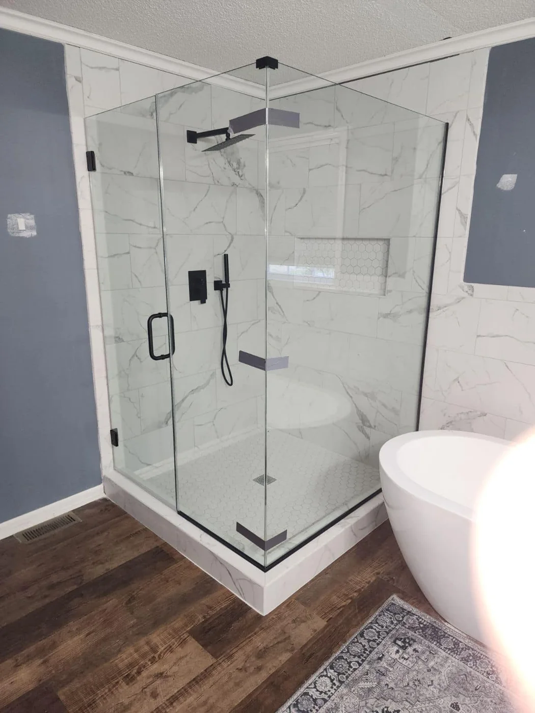 Glass shower installation by Williams Plumbing & Repair LLC
